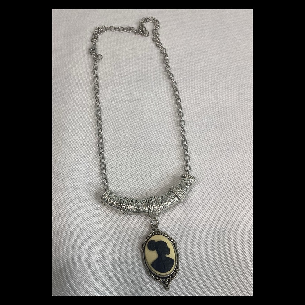 Black and cream cameo necklace.101